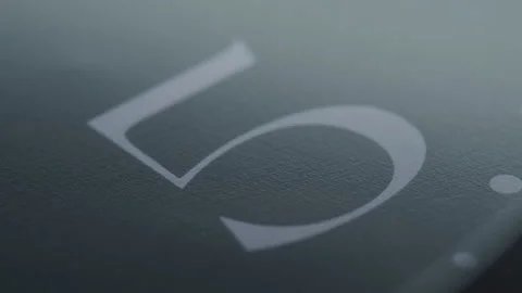 Close of a 5 on a Clock as the Second Hand Passes Stock Footage 208787814