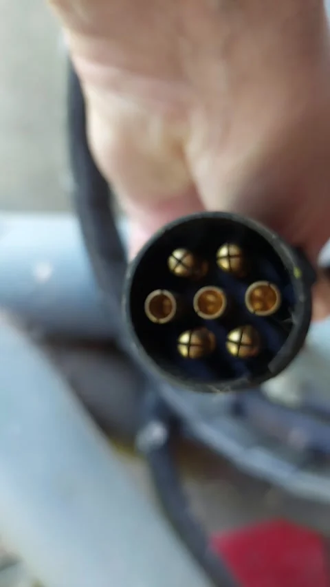 Close-up of 7-pin trailer connector plug for car towing Stock Footage 334567566