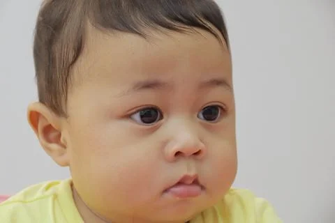 Close-up of an 8-month-old baby's face Fotos de archivo