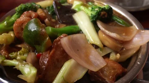 Close-up from above of a typical Peruvian Chinese meal of Chifa chicken and Stock Footage 167293563