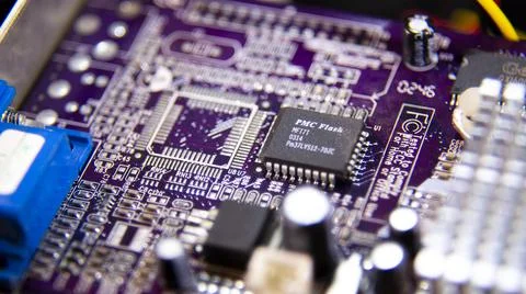 Close-up. Abstract background. Microchips on an electronic board Stock Photos