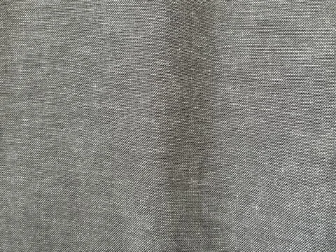 Close-up abstract background texture of textured dark grey denim Stock-Fotos