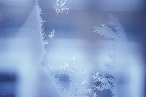 Close up of an abstract blurred freezing patterns on the glass window with copy Stock Photos