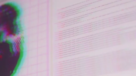 Close up of Abstract Blurred Program Running on Computer Screen at Night Video stock 219548679