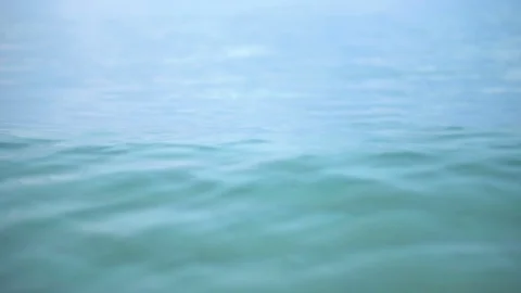 Close Up Abstract Calm Ocean Waves in Blue Water Stock Footage 120330573