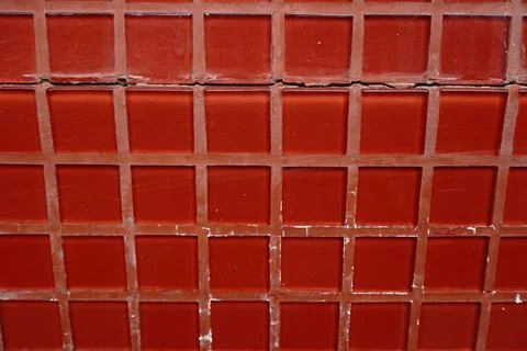 Close-up abstract full frame view of a distressed red mosaic tile wall Stock Photos