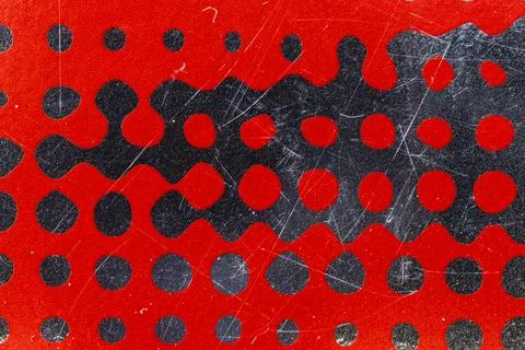 Close-up abstract image of a red surface with a pattern of circles, wavy li.. Stock Photos