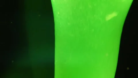 Close up abstract macro shots of green lava lamp background Video stock 267315109