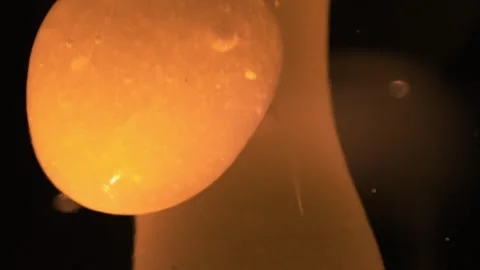 Close up abstract macro shots of orange lava lamp background Stock Footage 267315532