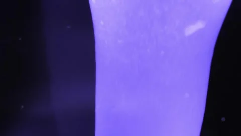 Close up abstract macro shots of purple lava lamp background Stock Footage 267317812