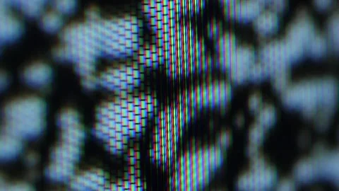 Close-up of abstract pixelated screen patterns.Handheld, selective focus. Stock Footage 328625451