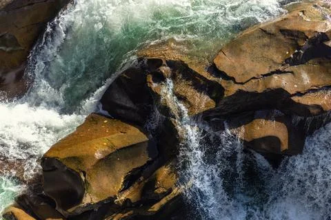 Close-up abstract texture above view of river torrent and clear fresh cold water Stock Photos