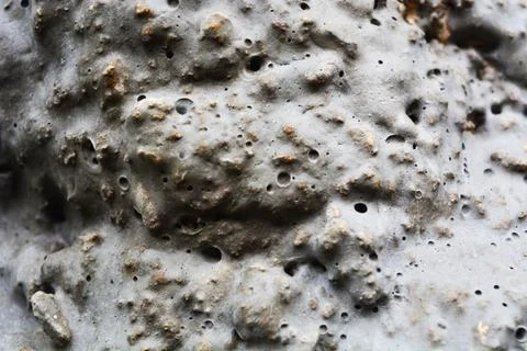 Close up abstract texture formed from a collection of stones and forming a .. Stock Photos