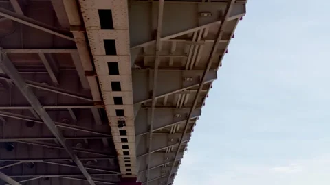 Close-up abstract view of the riveted steel framework beneath the John Frost Stock Footage 339837276