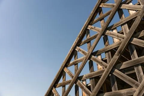 Close-up of abstract wooden framework with diagonal beams creating geometric Stock Photos