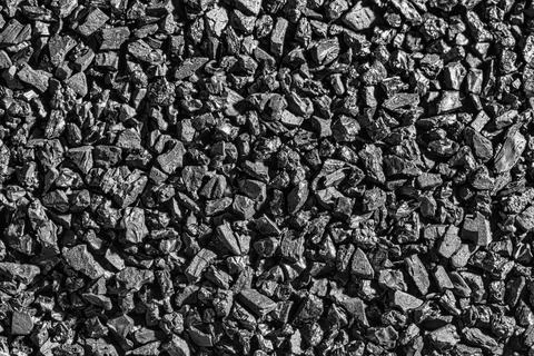 Close-up activated carbon texture. Coconut charcoal. Stock Photos