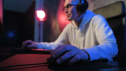 Close-up addiction guy with manly hands playing video game on computer screen Stock Footage 90692711
