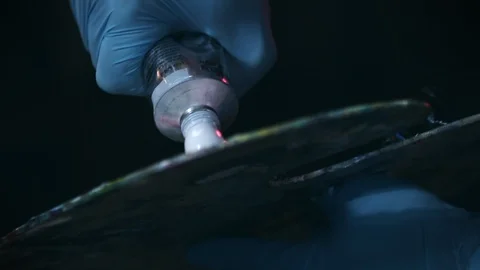 Close up adding paint to artist paint palette in slow motion	 Vídeo Stock 99997610