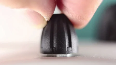 Close up on adjusting microscope knob. Stock Footage 97223994