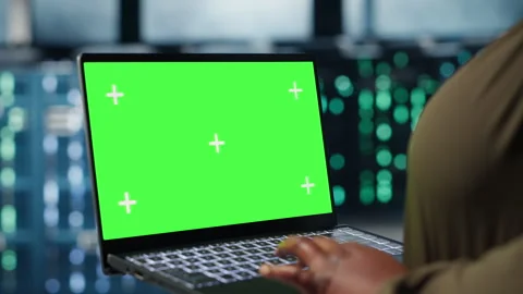 Close up of admin working in data center using green screen laptop Stock Footage 317202744