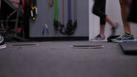 Close up of adults in workout facility executing a core training workout Video stock 95942273