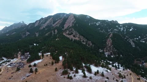 Close Aerial of Boulder Flatirons' Towering Rock Formations and Forested Base Stock Footage 300831391