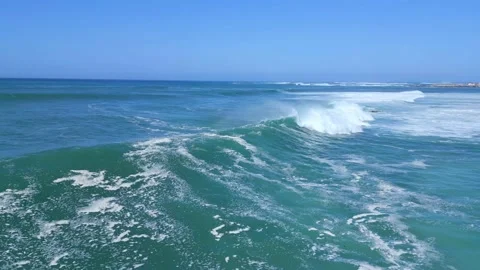 Close up aerial clip of large breaking waves at El Cotillo Fuerteventura Stock Footage 223665862