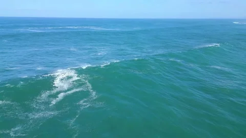 Close up aerial clip of large breaking waves at El Cotillo Fuerteventura Stock Footage 223665908