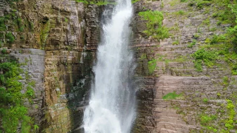 Close Aerial Drone Ascent From Base to Top of Larose Waterfall in 60FPS Stock Footage 317449041