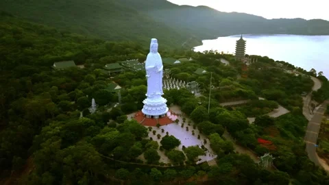 Close aerial drone view of Lady Buddha statue overlooking Da Nang Vietnam Stockbeeldmateriaal 340597557