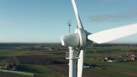 Close-up aerial drone view windmills wind turbines producing electricity Stock Footage 165905910