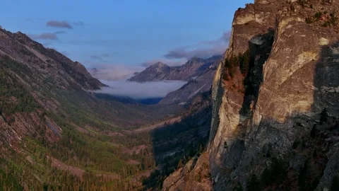 Close Aerial of Granite Cliff Edge Blodgett Canyon Stock Footage 331758659