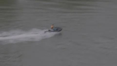 Close Up Aerial Of Jet Ski Turning Fast With Large White Spray Stock-Footage 343547381