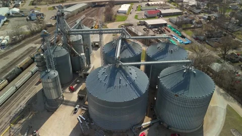 Close Aerial Orbit Around Grain Silos And Elevated Conveyors Stock Footage 342155019
