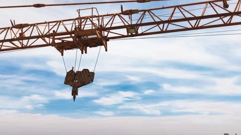 Close Up Aerial Orbit Around Tower Crane Hook Above High Rise Construction Site Stock Footage 337133509