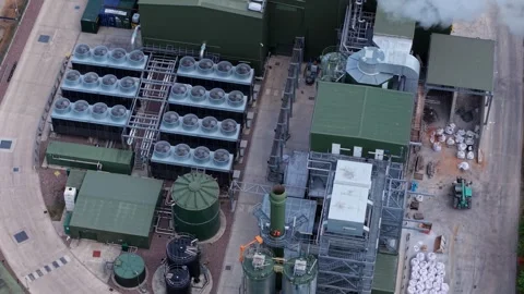 Close up aerial push in towards large industrial axial fan spinning on Видео 348093368