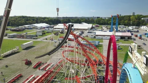 Close Aerial of Rollercoaster being build up at Oktoberfest Stock Footage 165478221