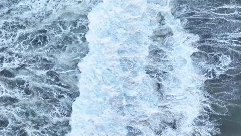 Close aerial texture of turbulent ocean foam Stock Footage 335440329