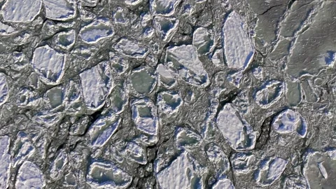 Close aerial top-down drone shot of intricate ice detail and frost patterns on Stock Footage 347185077