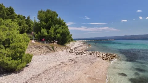 Close Aerial View Of Beach And Adriatic Sea In Podstrana, Croatia Stock Footage 342146334