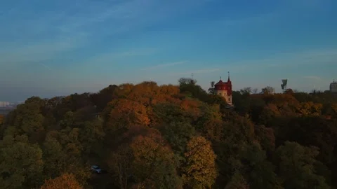 Close aerial view of castle-style puppet theatre building in Kyiv park Video stock 346500859