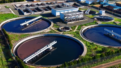 Close-up aerial view of clarification tanks at a treatment plant Stock Footage 327928818