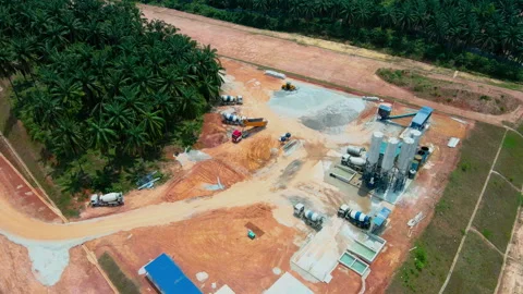 A close aerial view of a concrete batching plant with cement silos. Stock Footage 320313836