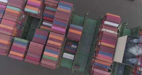 Close-up Aerial view of container ship passing by Stock Footage 158760769