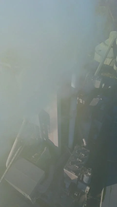 Close up aerial view of the conveyor systems and processing units at a UK Stock Footage 333937911