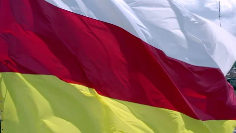 Close-up aerial view of the flag of North Ossetia Stock Footage 158729683