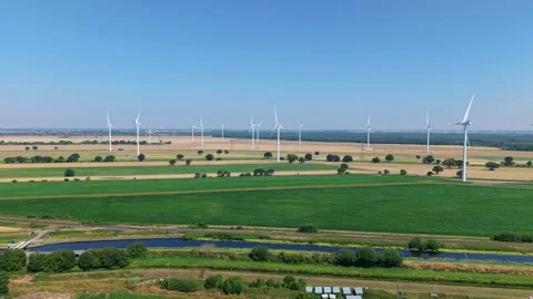 Close-Up Aerial View of Large Onshore Wind Farm and Renewable Power Turbines Stock Footage 341475384