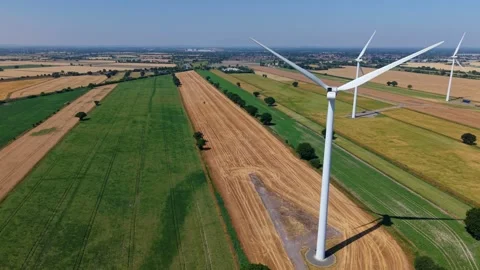 Close-Up Aerial View of Large Onshore Wind Farm and Renewable Power Turbines Stock Footage 341475448