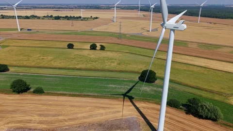 Close-Up Aerial View of Large Onshore Wind Farm and Renewable Power Turbines Stock Footage 341475459
