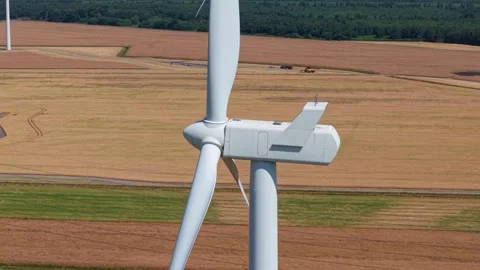 Close-Up Aerial View of Large Onshore Wind Farm and Renewable Power Turbines Stock Footage 341475468